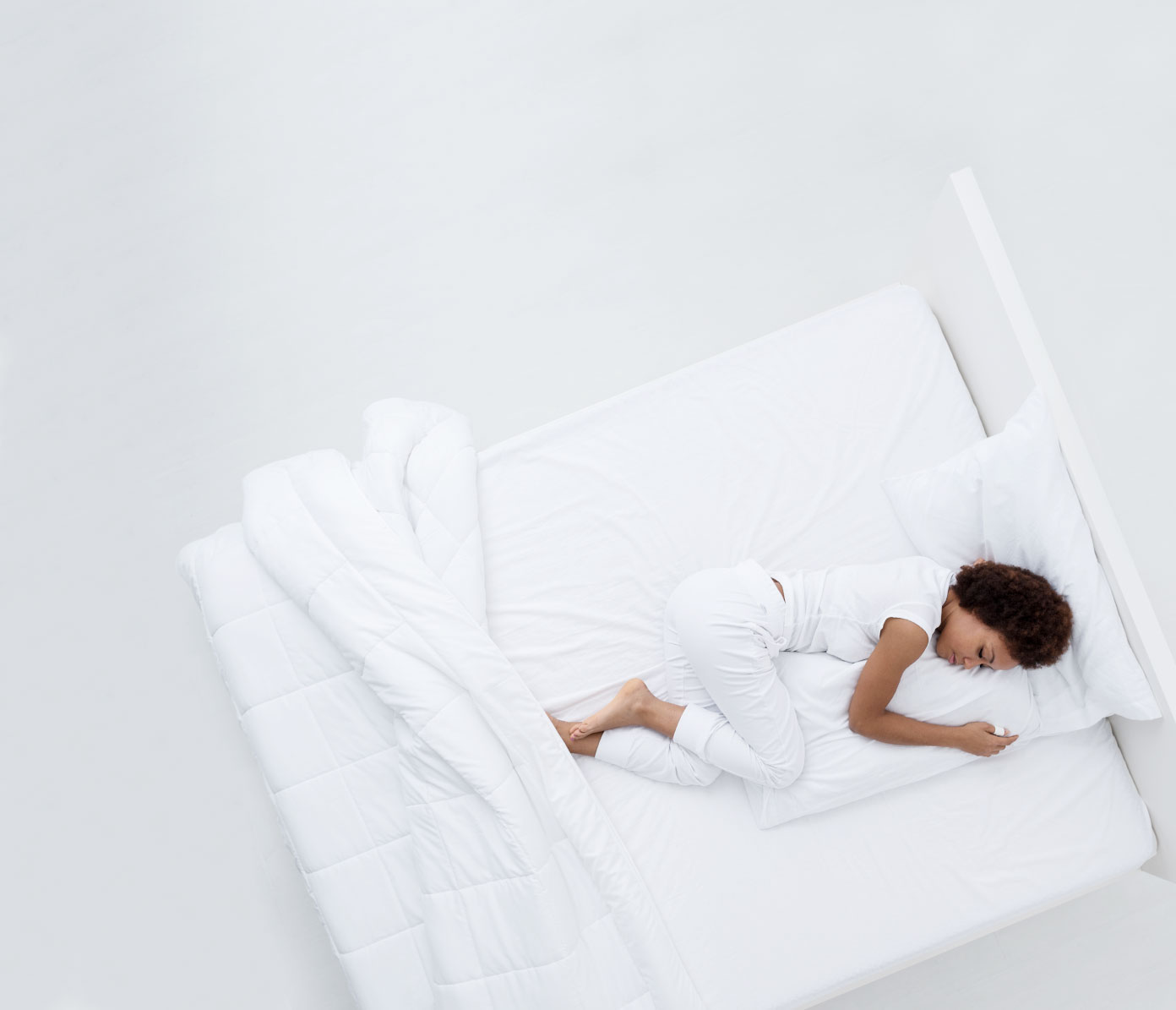 Woman Sleeping In White Bed